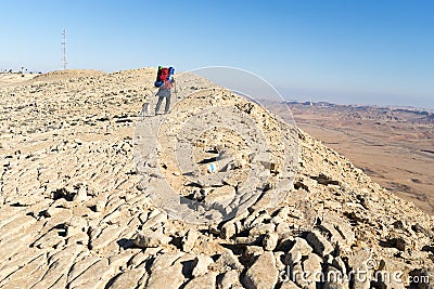 Trekking in Negev dramatic stone desert, Israel Editorial Stock Photo