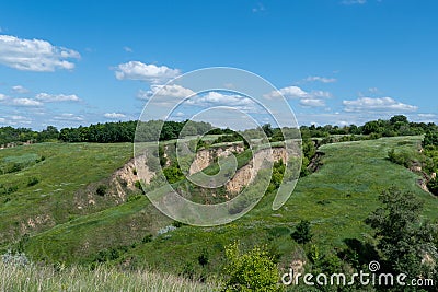 View ravine covered with greenery. Landscape valley with geological faults. Stock Photo