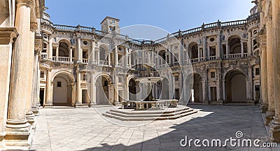 View at the Renaissance main cloister, with ornamented fountain in the middle, an iconic piece of the Portuguese renaissance type Stock Photo