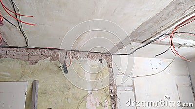 dismantling of walls, installation of an electrician, the process of repair Stock Photo