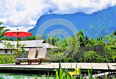 View of the resort`s pool and mountains in nature Stock Photo