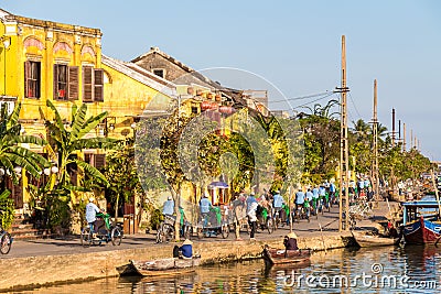 A view of the river, with a cyclo bike tour in the background, Hoi An, Vietnam - January 10th, 2015 Editorial Stock Photo