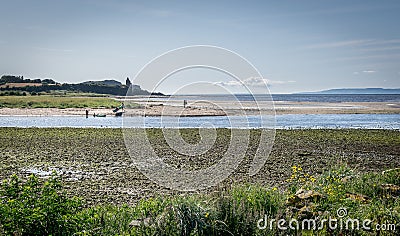 A view river doon estuary with canoeists and a photographer Stock Photo