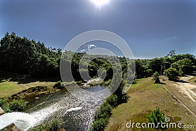 View of a river of Galicia Spain and drainage of a reservoir seen from the top of the dam Stock Photo