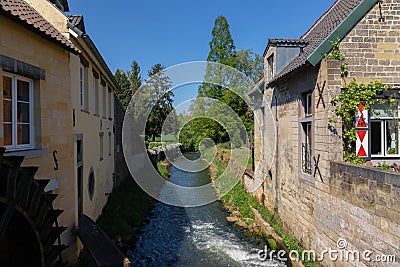 View on the river Jeker english Jeker, the lock and the former Lombok english Lombok watermill in Maastrich Editorial Stock Photo