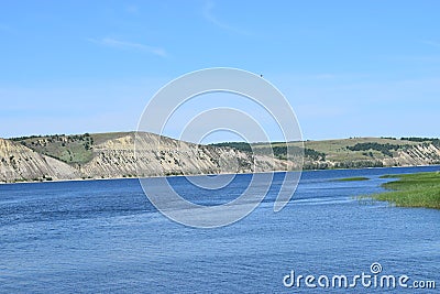 View of the river and the other Bank with a hill on a summer day Stock Photo