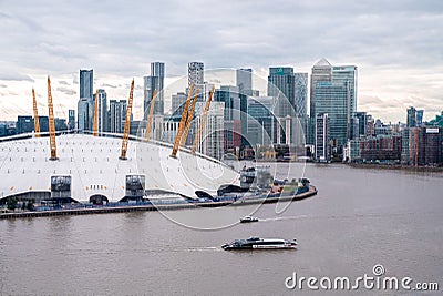 View from the river Thames over Millennium dome or O2 Arena in London. Editorial Stock Photo