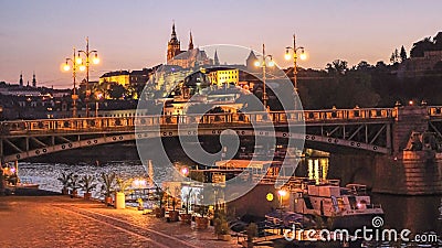 Vltava river and Prague Castle at nightfall Stock Photo