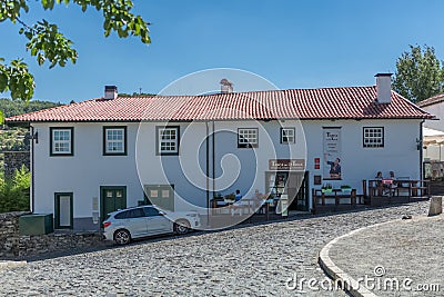 View at the road on Braganca city downtown, with a promenade snack bar on classic buildings Editorial Stock Photo