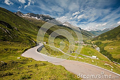 View of road from Furka pass, Realp city below Stock Photo