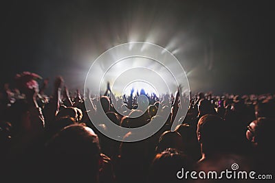 View of rock concert show in big concert hall, with crowd and stage lights, a crowded concert hall with scene lights, rock show pe Editorial Stock Photo