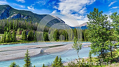 View from the Rocky Mountaineer train traveling through the Rocky Mountains Stock Photo