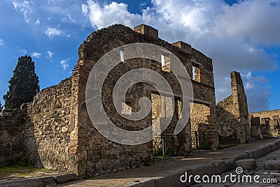 View of the roman ruins destroyed by the eruption of Mount Vesuvius centuries ago at Pompeii Archaeological Park in Pompei, Italy. Editorial Stock Photo