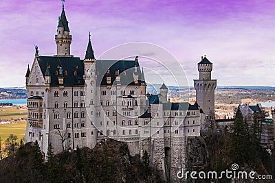 View of romantic Neuschwanstein castle at sunset in Bavaria, Germany Stock Photo