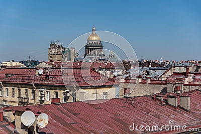 View on roofs of old buildings historic center of Sankt Peterburg and dome of St Isaac Cathedral. Stock Photo