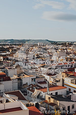 View of the rooftops in Seville, Spain, during golden hour Editorial Stock Photo