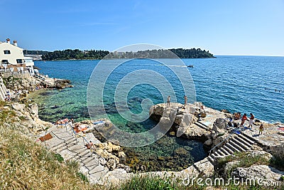 View on Rovinj central town beach and Adriadic Sea Editorial Stock Photo