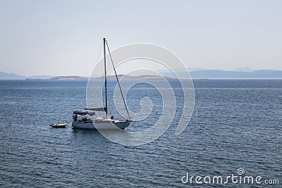 View of a sail boat, Aegean sea and landscape captured in Ayvalik area of Turkey. Editorial Stock Photo