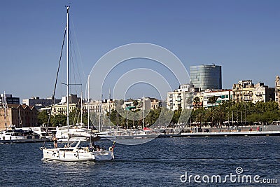 View of a sailboat arriving Barcelona marina Editorial Stock Photo