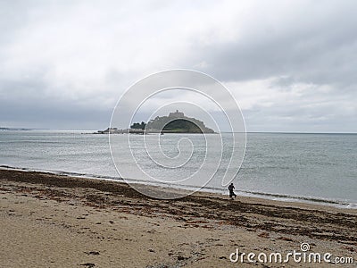 View of Saint Michael's Mount Cornwall England from beach with sea weeds Stock Photo