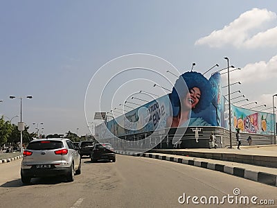 View of samba road in the Luanda city downtown center with people, vehicles and buildings Editorial Stock Photo