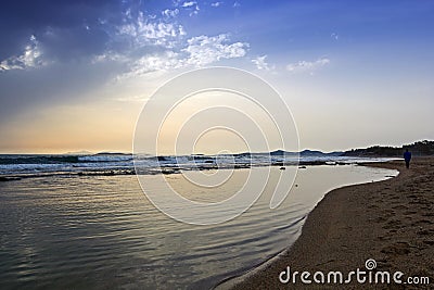 View of a sandy beach in a windy weather Stock Photo