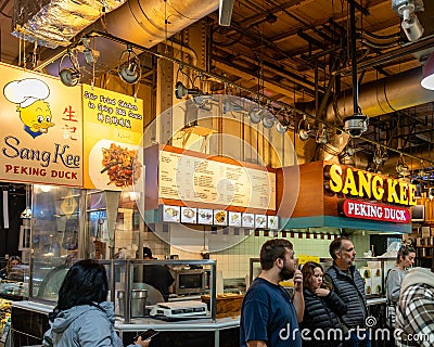View of Sang Kee Peking Duck in the historic Reading Terminal Market, an enclosed public Editorial Stock Photo