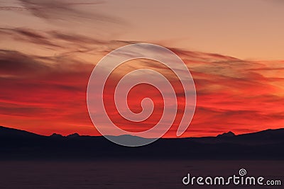 View from Schoeckl over low stratus to Karawanks, Triglav, sunset Stock Photo