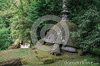 View of sculpture amidst the vegetation in the Park of Bomarzo. Stock Photo