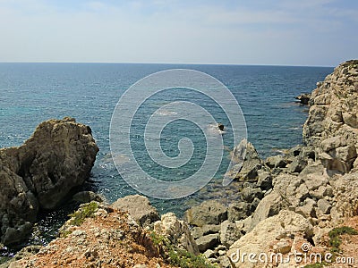 View of the sea from rocky coast Stock Photo