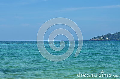 View of the sea, sky and mountains overgrown with jungle Tri Trang Beach in Phuket Stock Photo