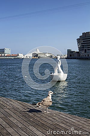 View of a seagull and sculpture on sea Editorial Stock Photo