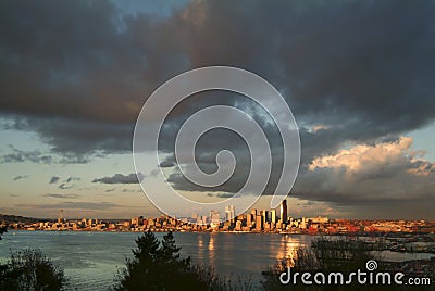 Seattle Skyline During a Dramatic Sunset and a Rain Squall Passing Through. Stock Photo