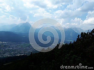 View of Seefeld village and mountains around from Bergbahnen Rosshutte on a cloudy day, Austria Stock Photo