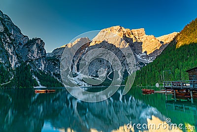 View of Seekofel Mount in The Dolomites Mountain in the morning reflecting on The Lake Braies Stock Photo