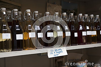 View of shopboard with bottles puring virgin olive oil Editorial Stock Photo