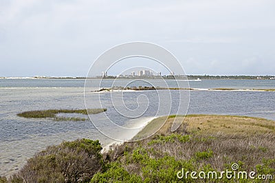 A view of the skyline of Perdido Key from the waters of Big Lagoon State Park in Pensacola, Florida Stock Photo