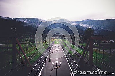 View on smoke mountains from the railway station Stock Photo