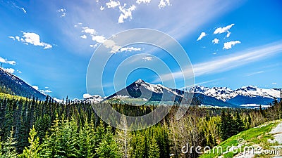 View of the snow capped Coast Mountains along Highway 99, also called The Duffey Lake Road Stock Photo