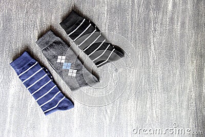 View of socks different colors and styles on vintage gray background Stock Photo