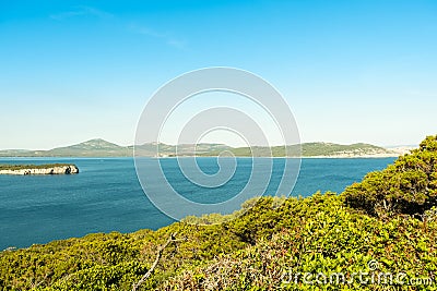 View on the Spanish Tower and the beach Mare Pintau in Sardinia, Italy. Stock Photo