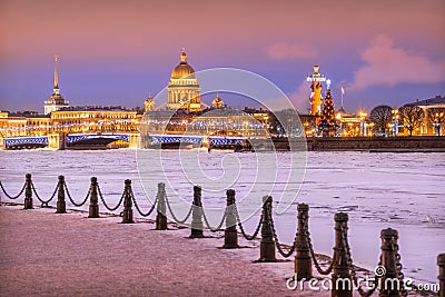 View of St. Isaac's Cathedral Palace Bridge Rostral Column on the Strelka in St. Petersburg Stock Photo