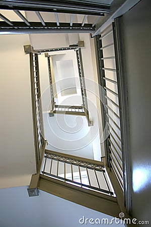 View Of Staircase Turning Looking Up Stock Photo