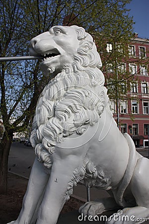View of the statues of lions and the facade of the building Stock Photo