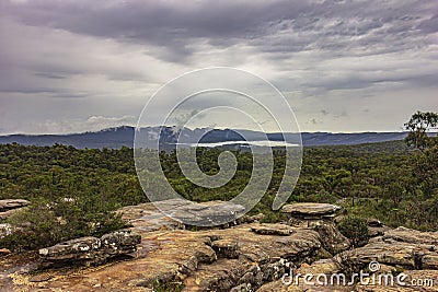 View during storm from sandstone cliff of Reeds Lookout in Grampians National Park, Victoria, Australia. Stock Photo