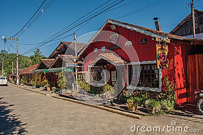 View of street, colorful houses and blue sky in MaringÃ¡. Editorial Stock Photo