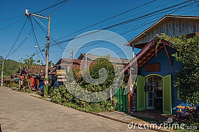 View of street, colorful houses and blue sky in MaringÃ¡. Editorial Stock Photo