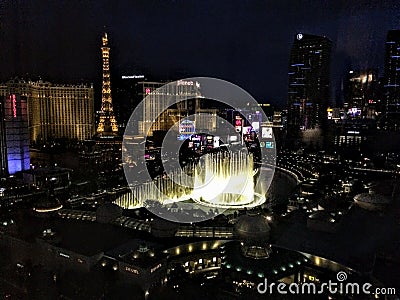 View of the Strip in Las Vegas Dancing Fountain Night Show at Bellagio Hotel. Paris Paris Editorial Stock Photo