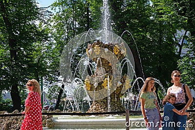 View of the Summer Garden park opened after the Covid-19 pandemic in the city center, the main fountain with many sculptures, visi Editorial Stock Photo