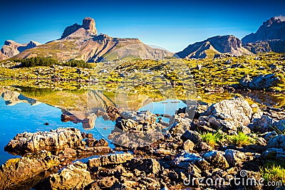 View of the sunny Lago Rienza - Ursprung in National Park Tre Ci Stock Photo